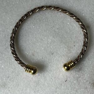 Elegant Gold and Silver Twisted Bracelet